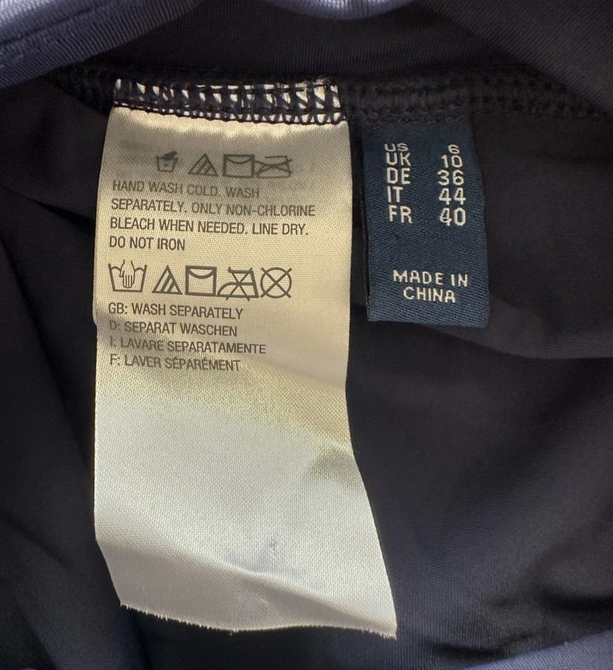 D&CO. Vestido sin mangas traje de baño de dos piezas con falda corta Foto 2 de 4