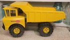 Tonka Mighty Dump Truck Pressed Steel Yellow Construction Vehicle