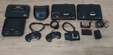 4 Sega Consoles, 1 Master System Converter, 3 controllers, 1 Adapter (Untested)