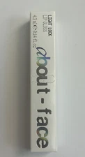 About Face Light Lock Lip Gloss PLASTIC PETAL .14oz *NEW*