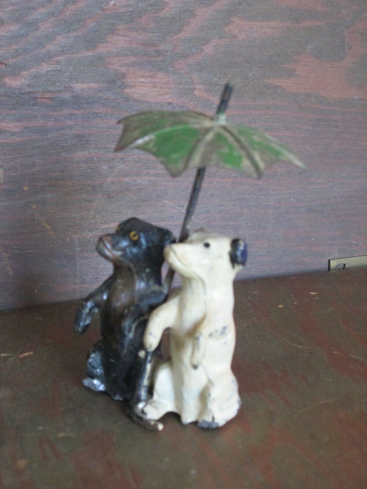 Vintage Antique German Cast Metal White & Black Dogs Sharing Umbrella Figurine 