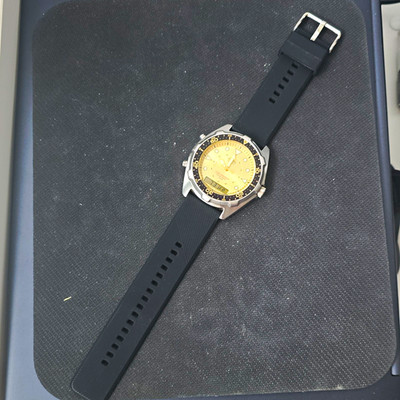 Casio AMW-320D Analog-Digital Alarm Chronograph Gold Dial Black Resin Strap 100m