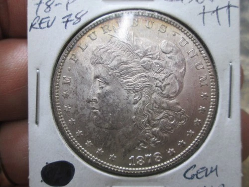 US 1878 REV OF 78 7 TAIL FEATHERS MORGAN DOLLAR COIN IN UNCIRCULATED CONDITION