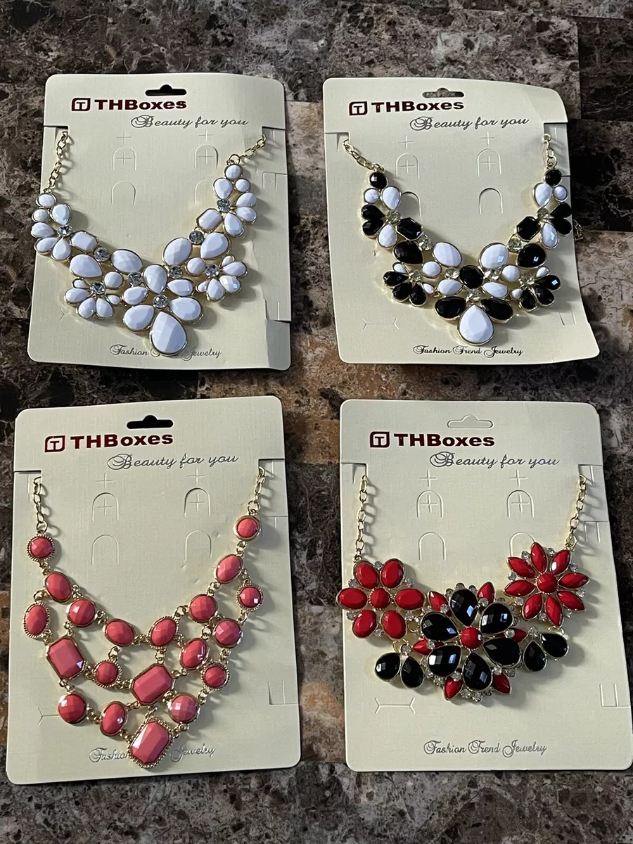 White costume shop jewellery