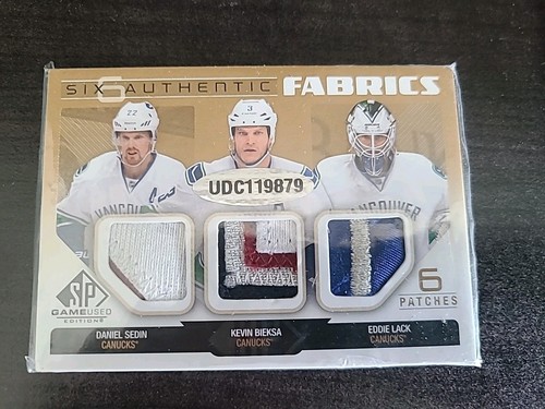 2014-2015 Upper Deck Six Authentic Fabrics Daniel Sedin, Kevin Bieksa,Eddie Lack