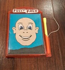 Vintage Fuzzy Face Magnetic Handheld Game 5"x4" Classic Male Face Rare Pre-owned