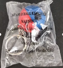 Tupperware SHAPE-O TOY Keychain Red and Blue with Yellow Shapes New / Sealed