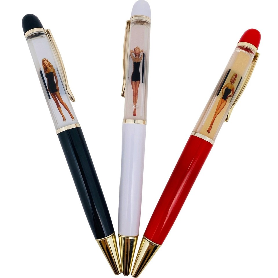 Classic tipping pen reveals a retro pin-up lady — a cheeky, old-school desk gag that never gets old.