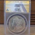 1886-0 Morgan Silver $1 Dollar ANACS AU50 Details (Cleaned) Cert #7711128