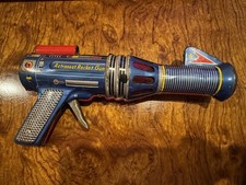 Vintage DAIYA "ASTRONAUT ROCKET GUN" Metal Litho SPACE TOY, JAPAN, 1960  s