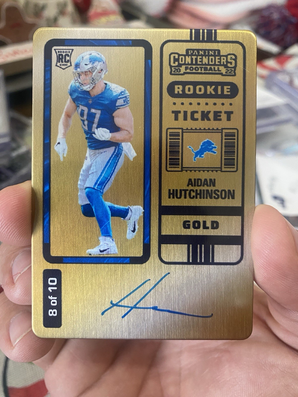 2022 Panini Contenders - Rookie Ticket RPS Aidan Hutchinson #102 Gold /10 Metal