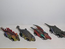 Lot of 4 Dinosaur Pull Back Toy Cars Stegosaurus Ankylosaurus Pterodactyl