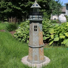 35 in Resin and Stone Solar LED Lighthouse Nautical Statue by Sunnydaze