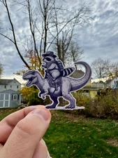 Giddy Up Cowboy! Cute Cowboy Raccoon Riding Dinosaur Sticker - Unique Vinyl Dec