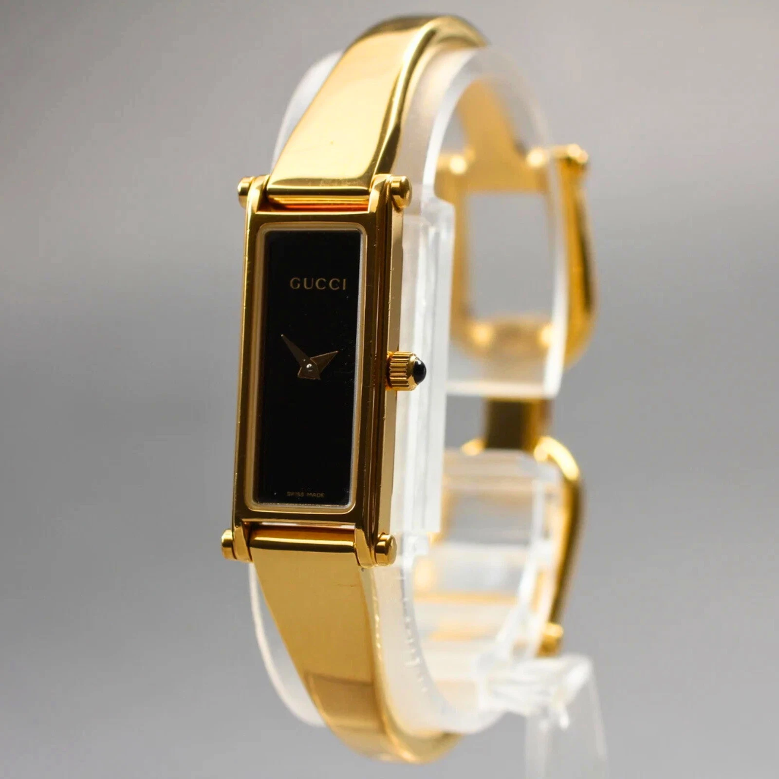 Montre à quartz femme vintage Exc+5 pile neuve GUCCI 1500L cadran doré noir 12 mm