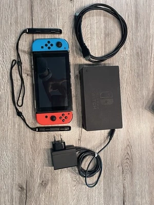 Packet: Nintendo Switch Konsole mit Joy-Con und Fit Ring - Bild 1 von 4