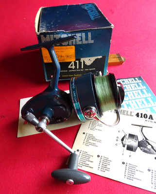 A VERY GOOD LIGHTLY USED VINTAGE BOXED MITCHELL 411A SPINNING REEL