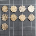 Lot of 9 Circulated Morgan Silver Dollars - Mostly 1921s, 1901, 1883, 1885