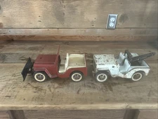 Vintage pressed Steel Tonka Jeep w/ snow plow wrecker boom also a junkyard jeep 