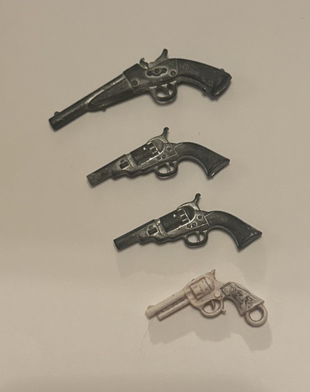 Lot of 4 Miniature Toy Cap Pistols Cowboy Western Guns 