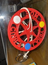 Three Stooges Red Spin Toy With Metal Rings From 1959 By Empire Plastics