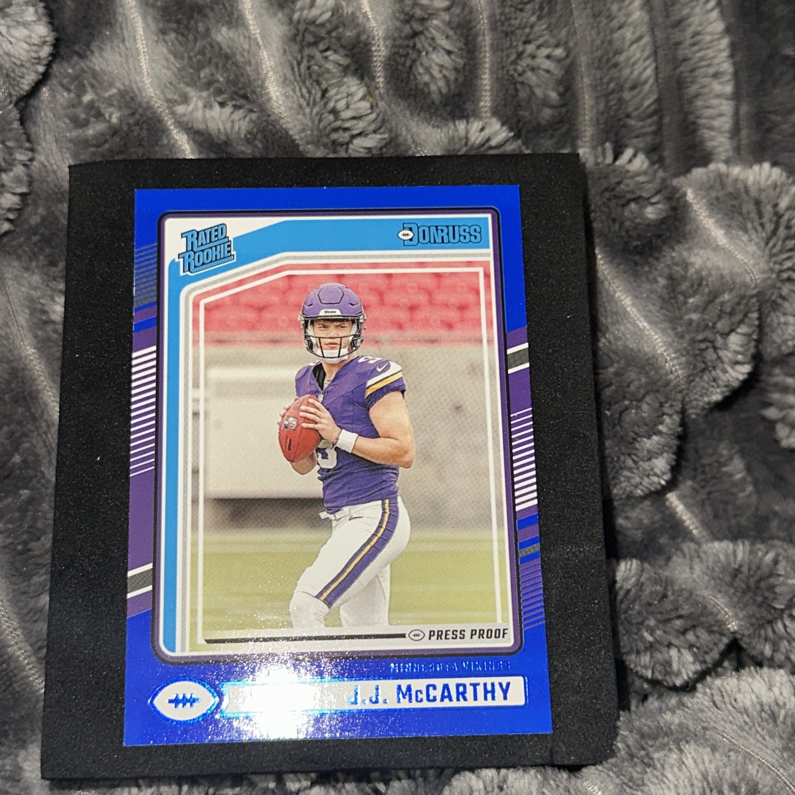 2024 Panini Donruss - Rated Rookie J.J. McCarthy #303 Blue Press Proof (RC)
