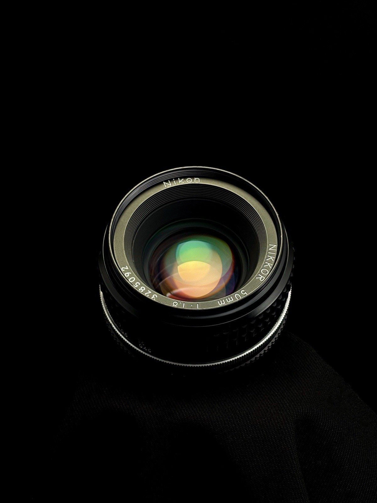 Vintage Nikon Nikkor 50mm AIS lens CLAd in amazing shape and