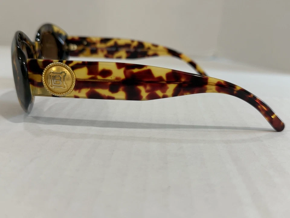 Очки солнцезащитные Laura Biagiotti LB720/S 02Y черепаховые золотистые 51-22 145, Coach жесткая подкладка - Изображение 4 из 4