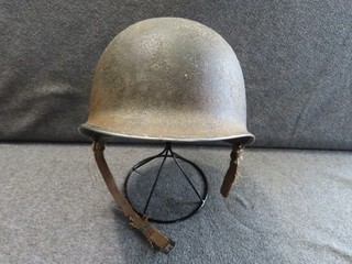 WWII US M1 HELMET FRONT SEAM FIXED BALE WITH WORN ORIGINAL CHINSTRAP