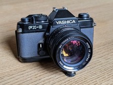 Yashica FX-3 analoge Spiegelreflexkamera mit 50mm Objektiv und Konverter