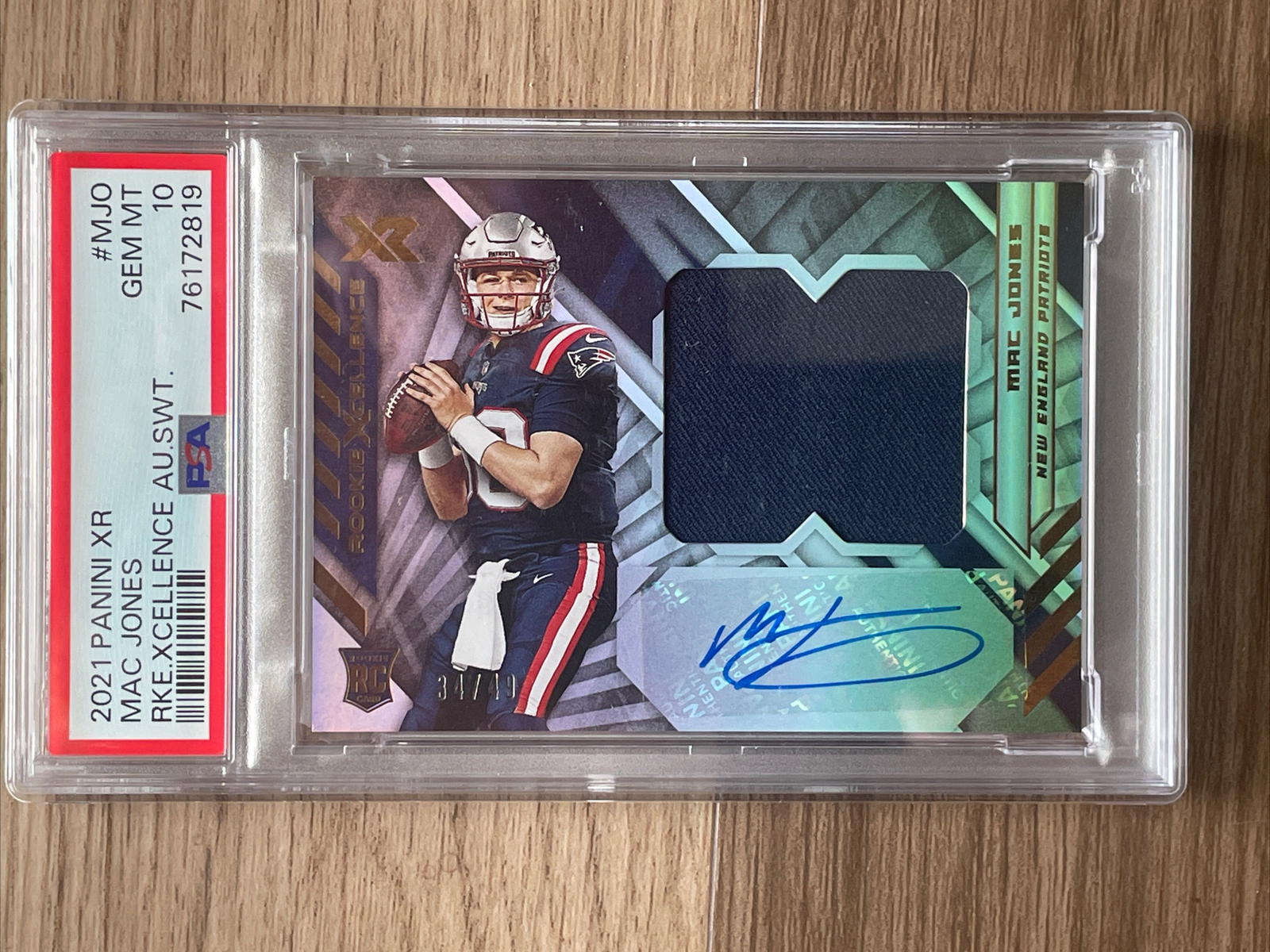 Mac Jones Panini XR Rookie Xcellence Autograph Swatches #MJO Base