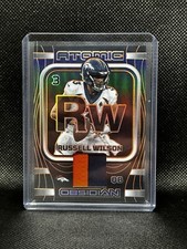 2023 Panini Obsidian Russell Wilson Atomic Materials Orange Electric Etch /49