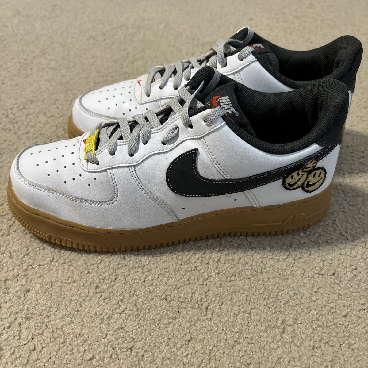 air force 1s with smiley face