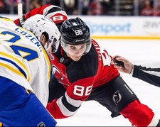 Jack Hughes 2024 Global Series Faceoff New Jersey Devils 8x10 NHL Hockey Photo