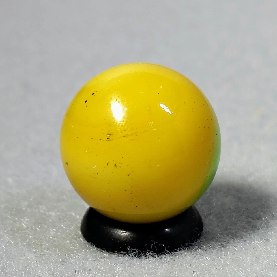 0.65" Peltier Comic Marble "Smitty" yellow & Green Partially on Patch HTF UV M- - Image 4 of 4