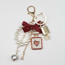 Authentic LV Louis Vuitton Gold Padlock Key Unbranded Bottle Keycharm Keychain