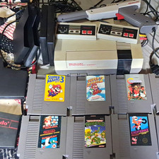 Nintendo NES Console Bundle 2 Controllers Light Zapper + Games Mario Contra TMNT