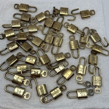 Authentic Louis Vuitton Lock And Key Set, Stamped And Numbered