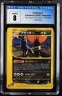 Pokémon Umbreon 2002 JPN The Town on No Map 067/092 1st Edition CGC 8