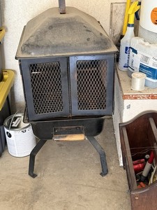 Black Metal Indoor Woodstove Heating Stove with Mesh Doors Handle Free Standing