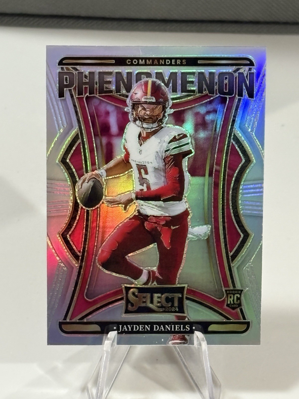 2024 Panini Select - Phenomenon Jayden Daniels #2 Silver Prizm (RC) Commanders