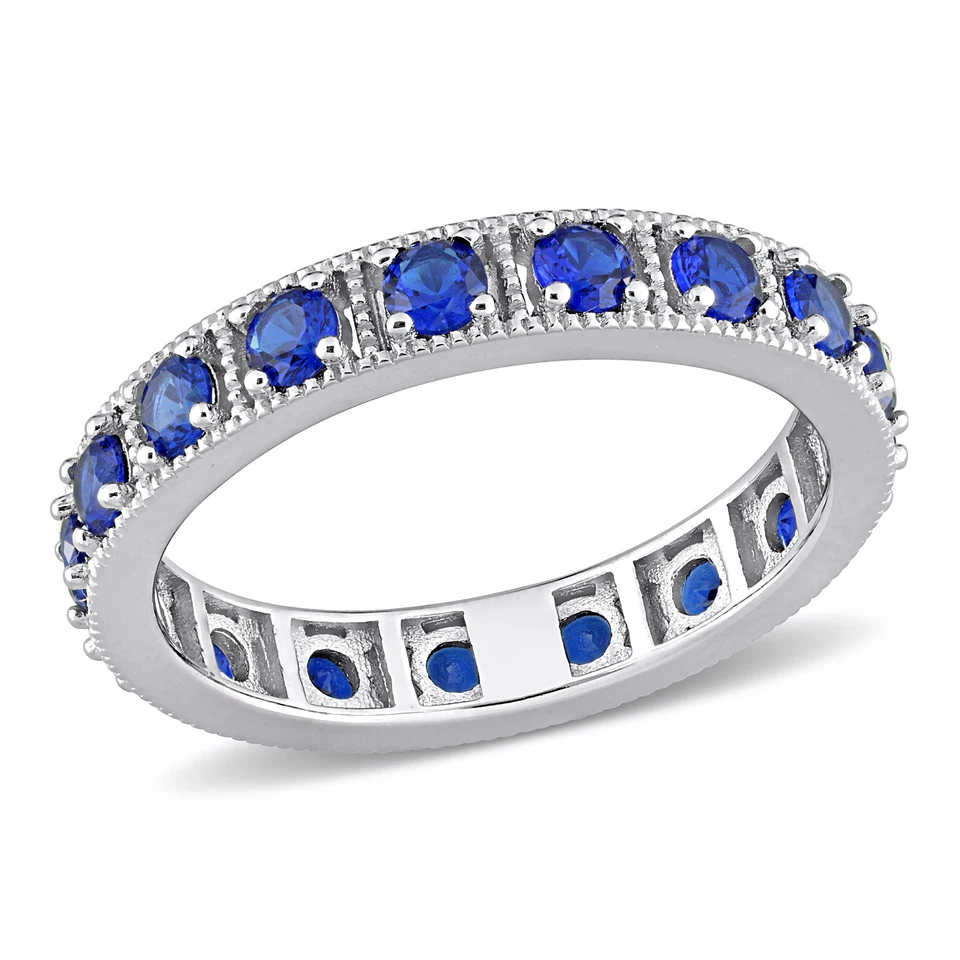 Anillo de eternidad Amour de plata de ley de 2 3/8 quilates TGW circonita cúbica azul