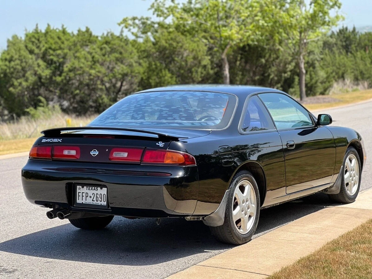 Black 1995 Nissan 240SX exterior rear view