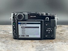 Fuji X10 black 12 megapixel optical zoom digital camera -100 working normally