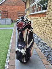 Titleist golf bag with clubs driver and putter Vintage