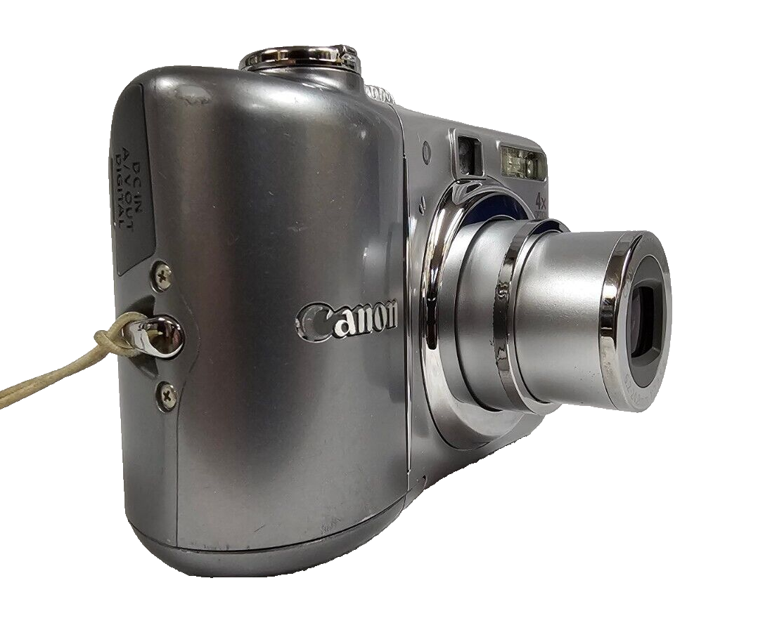 Working Canon PowerShot A1100 IS 12.1MP Silver Digital Camera 4x