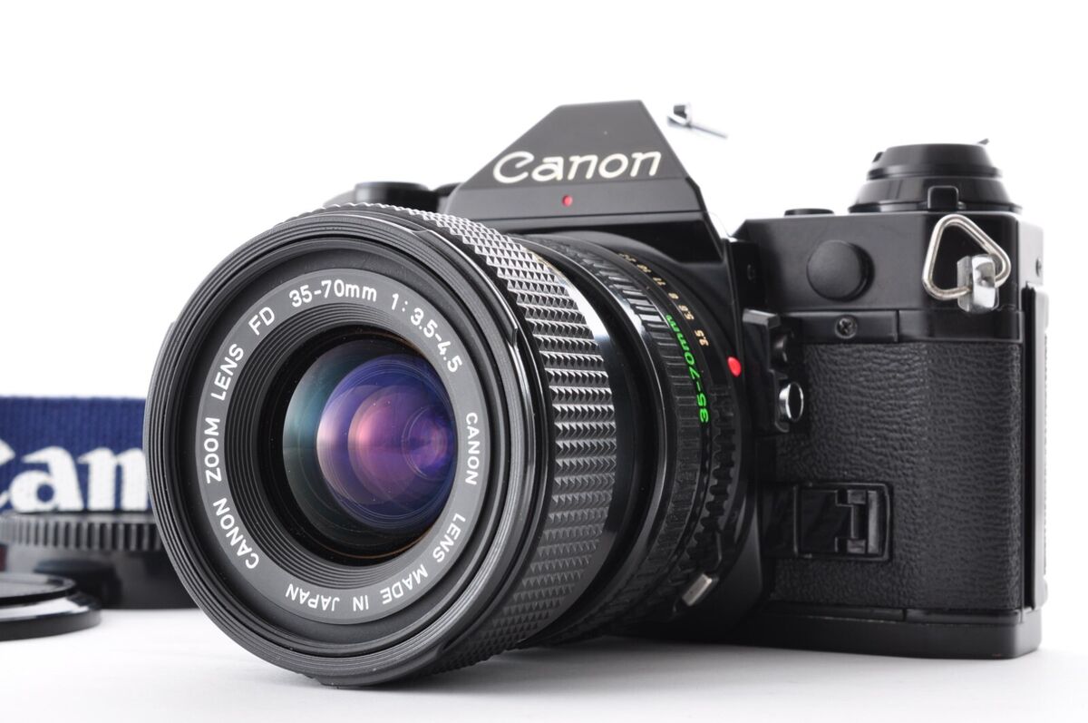 Canon AE-1 Program Black / Lens New FD 35-70mm f/3.5-4.5 Exc Canon AE-1 Program Black / Lens New FD 35-70mm f/3.5-4.5 Exc