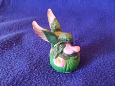 Hummingbird green with pink flower