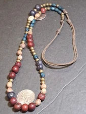 Primative Tribal Style bead Necklace Round stone beads brass  Wood Inset On Cord
