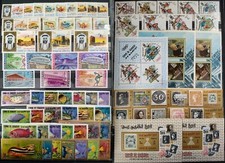 Worldwide Stamp Lots: Umm Al Qiwain MNH - 2 Album Pages of Different Full Sets